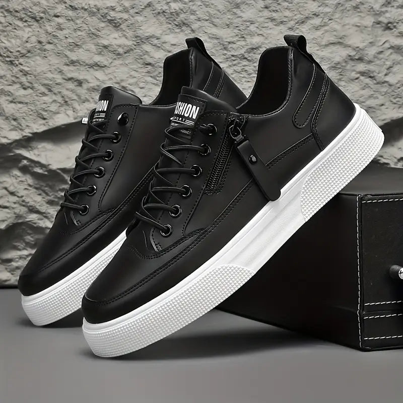 Mångsidiga herrskor sneakers i modern design, svart/vit med dragkedja, lämpliga som vardags- och streetwearskor.