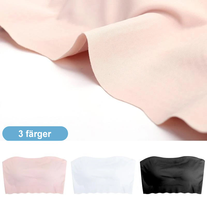 "Sömlös bandeau topp i mjuk nylon, vit färg, vår/somrig look, sömlös design, inga byglar, bekväm och stilren."