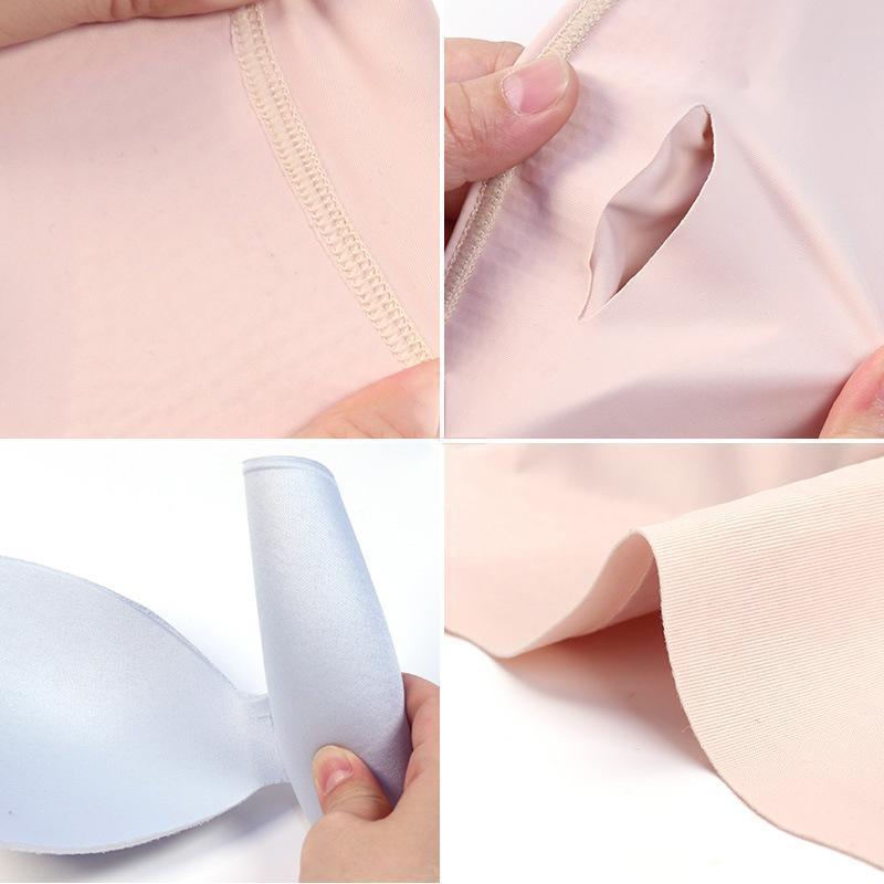 "Sömlös bandeau topp i mjuk nylon, vit färg, vår/somrig look, sömlös design, inga byglar, bekväm och stilren."