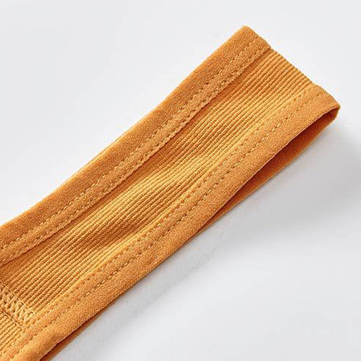 "Sömlös damherrdel för sport med push-up dyna, grå färg, nylon-spandex, perfekt för träning med flexibilitet och stil."
