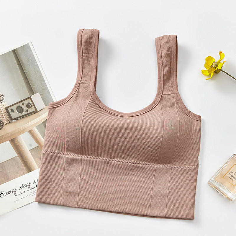 "Sömlös damherrdel för sport med push-up dyna, grå färg, nylon-spandex, perfekt för träning med flexibilitet och stil."