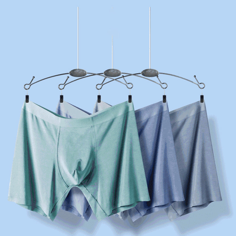 "Sömlösa gröna boxershorts för män med elastisk midja, korta ben och 3D-konturpåse för optimal komfort."