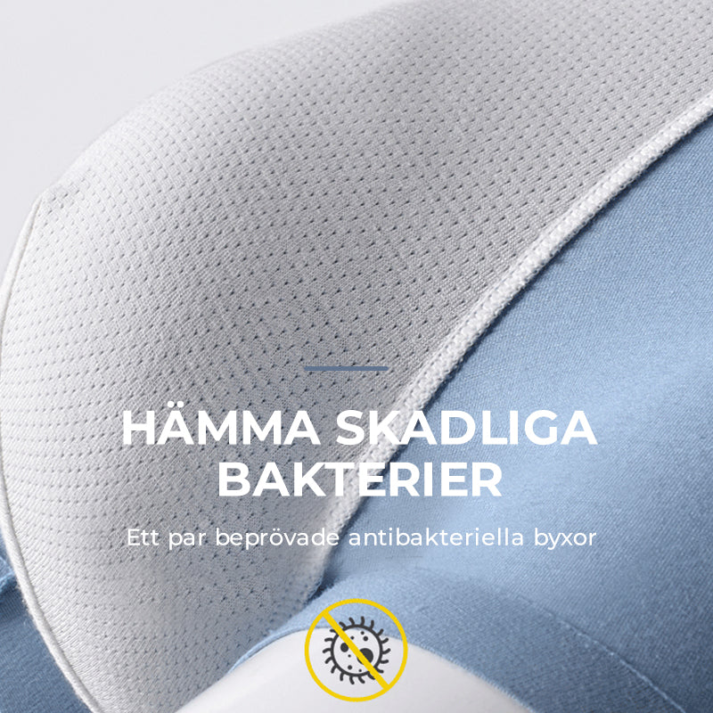 "Sömlösa gröna boxershorts för män med elastisk midja, korta ben och 3D-konturpåse för optimal komfort."