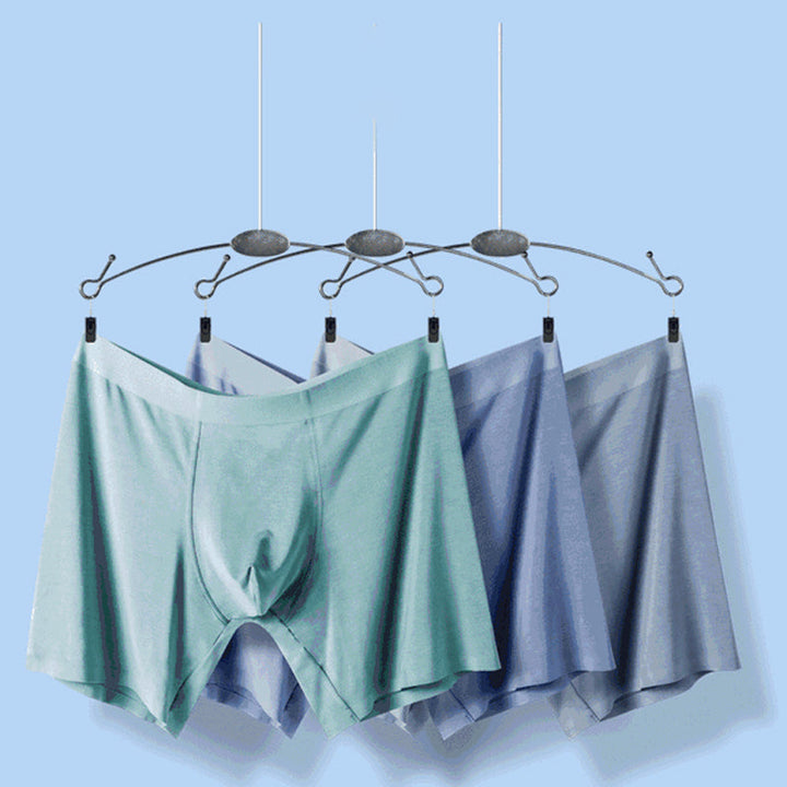 "Sömlösa gröna boxershorts för män med elastisk midja, korta ben och 3D-konturpåse för optimal komfort."