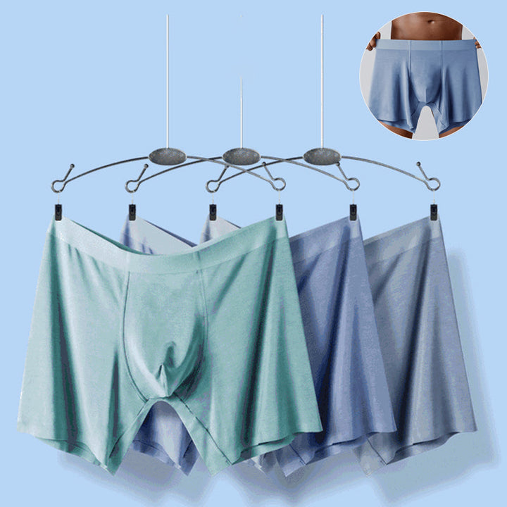 "Sömlösa gröna boxershorts för män med elastisk midja, korta ben och 3D-konturpåse för optimal komfort."