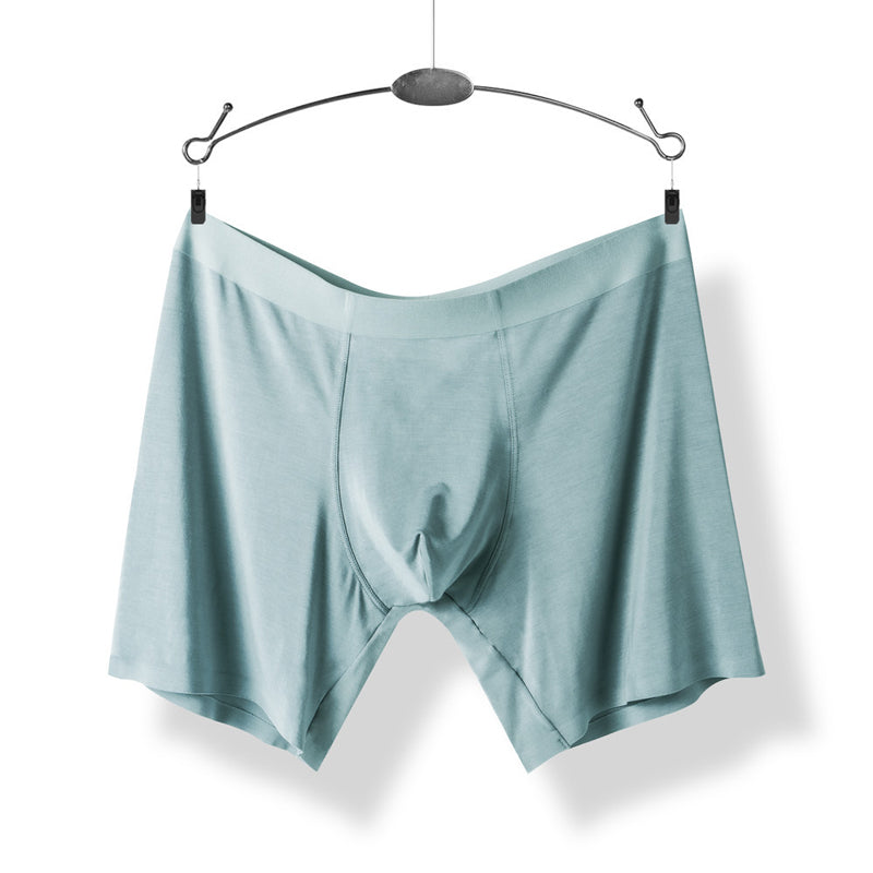 "Sömlösa gröna boxershorts för män med elastisk midja, korta ben och 3D-konturpåse för optimal komfort."