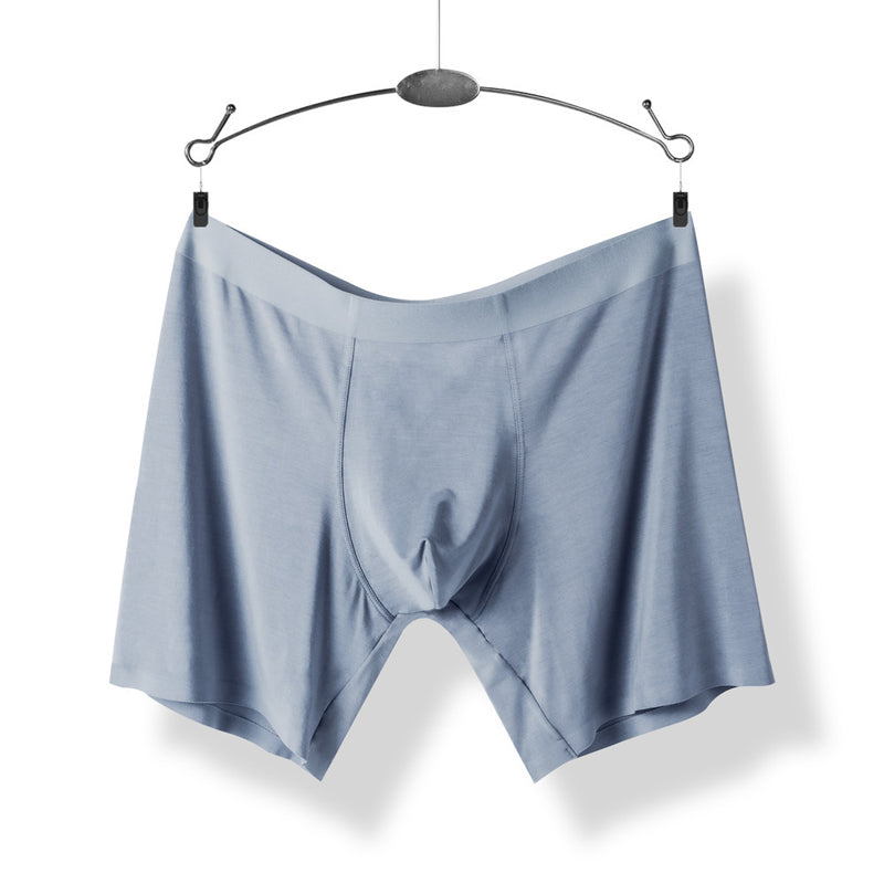 "Sömlösa gröna boxershorts för män med elastisk midja, korta ben och 3D-konturpåse för optimal komfort."