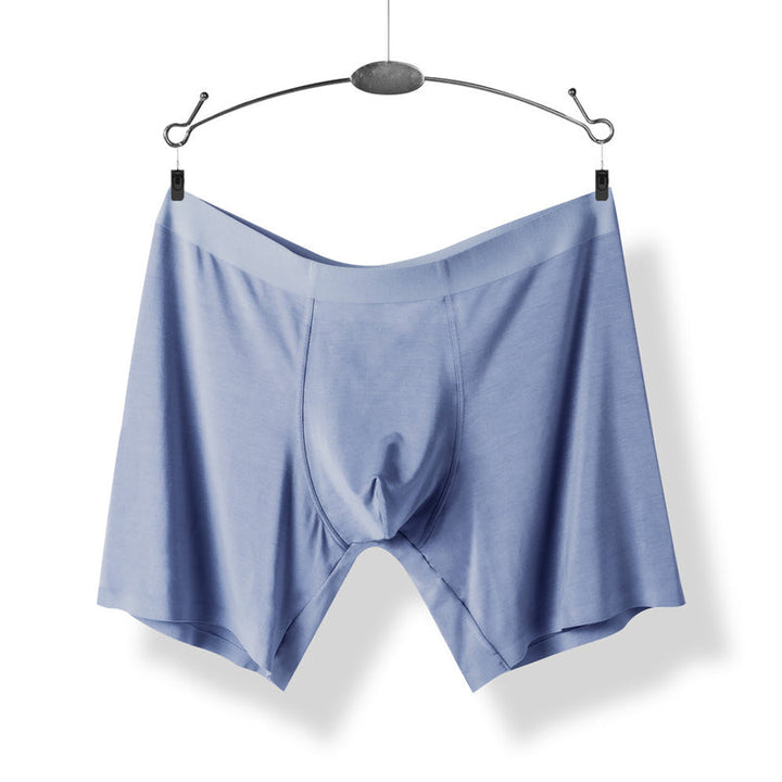 "Sömlösa gröna boxershorts för män med elastisk midja, korta ben och 3D-konturpåse för optimal komfort."