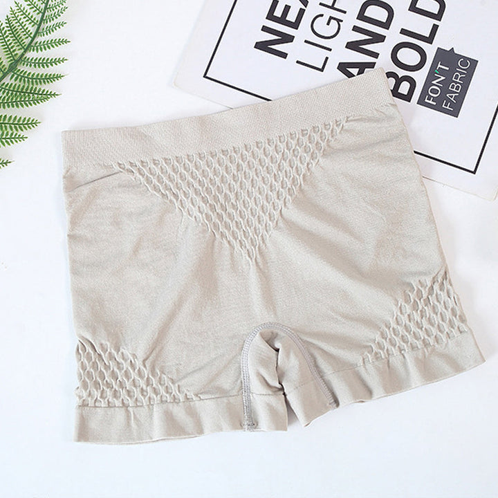"Sömlösa kvinna boxers i rosa spandex med magstöd, hög midja, bekväm passform för underkläder eller shapewear."