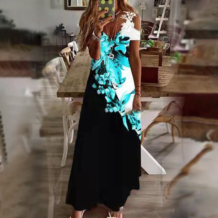 "Sommarklänning för damer, kortärmad med spetsdetaljer, blommigt mönster, maxilängd, feminin och elegant stil."