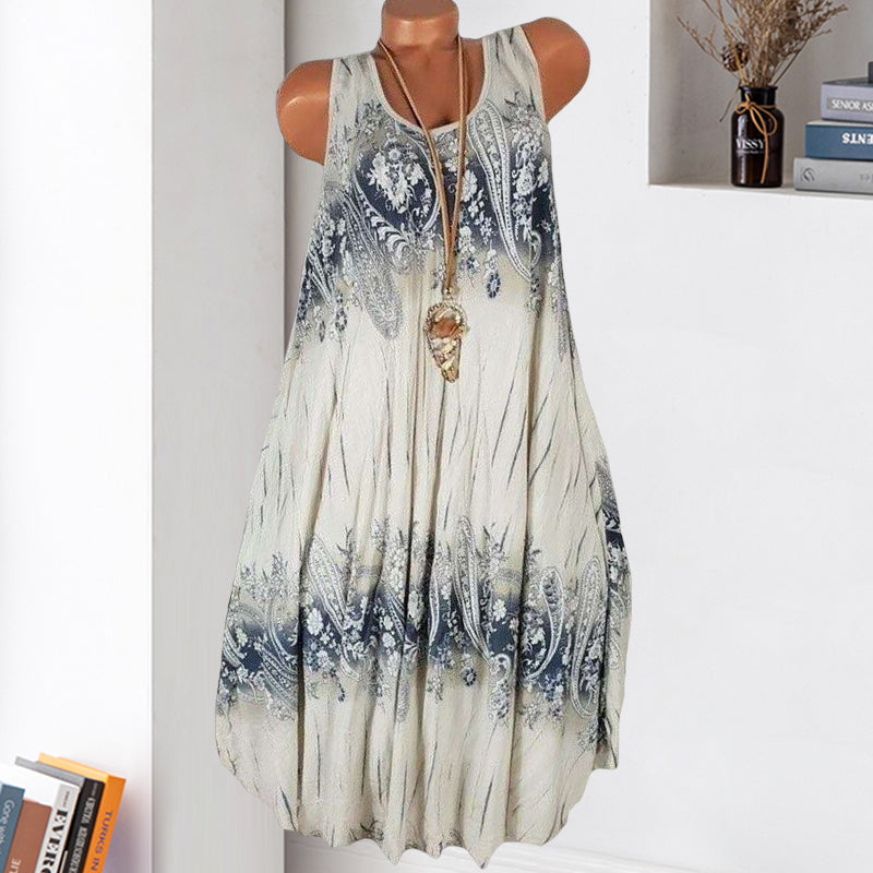 Sommarklänning för kvinnor i bohemiskt tryck, ärmfri design, bekvämt lätt tyg, perfekt för sommardagar.