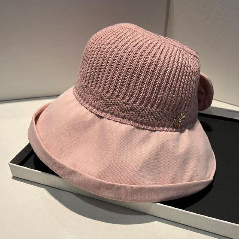 "Sommarmodesolhatt med bredt brätte, gul, UV-skydd, damaccessoarer, elegant, skyddar ansikte mot solen, bärbar design."