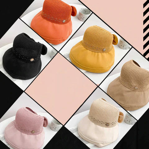 "Sommarmodesolhatt med bredt brätte, gul, UV-skydd, damaccessoarer, elegant, skyddar ansikte mot solen, bärbar design."