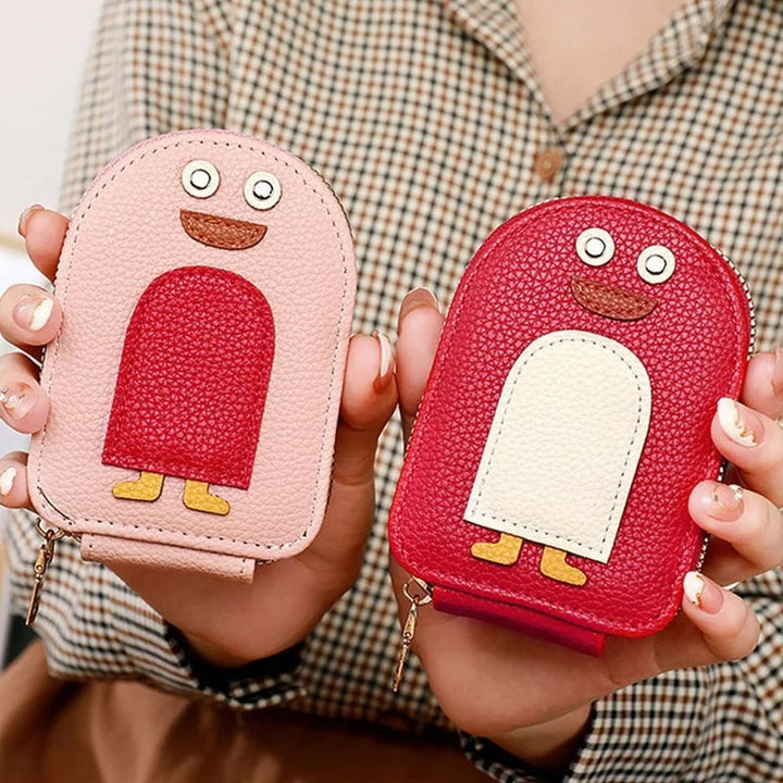 "Söt damplånbok i PU, pingvinmotiv, för kort/mynt. Ladies' accessory, kompakt och stilsäker med dragkedja."