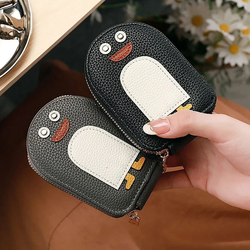 "Söt damplånbok i PU, pingvinmotiv, för kort/mynt. Ladies' accessory, kompakt och stilsäker med dragkedja."