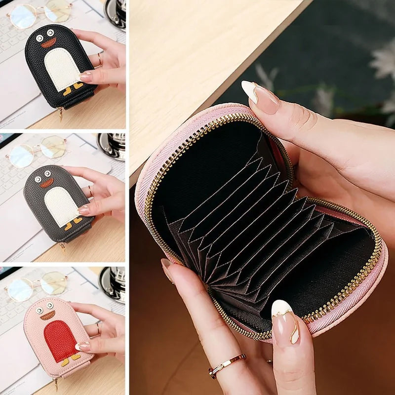 "Söt damplånbok i PU, pingvinmotiv, för kort/mynt. Ladies' accessory, kompakt och stilsäker med dragkedja."