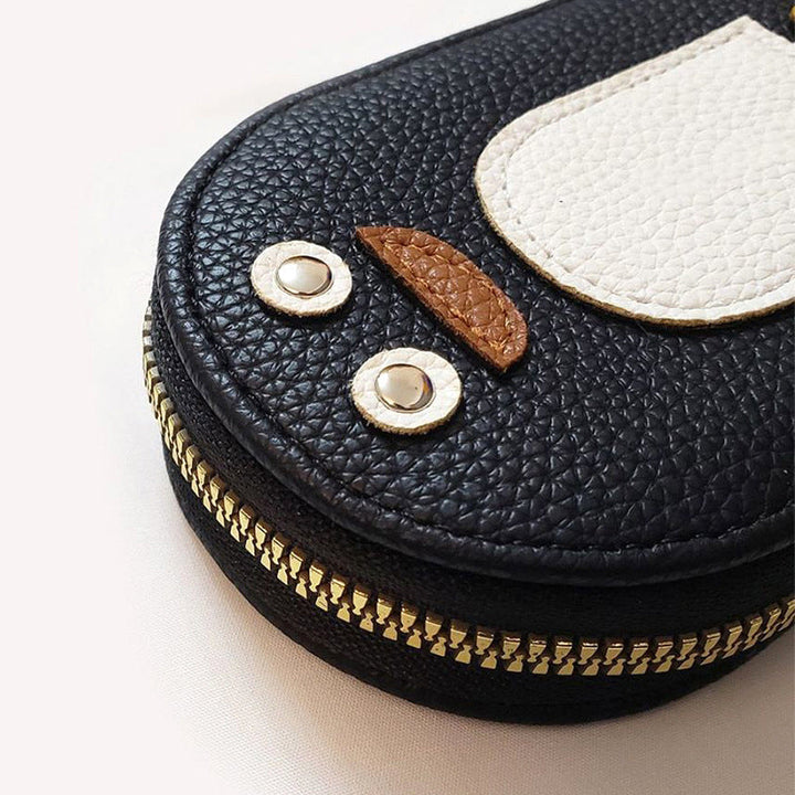 "Söt damplånbok i PU, pingvinmotiv, för kort/mynt. Ladies' accessory, kompakt och stilsäker med dragkedja."
