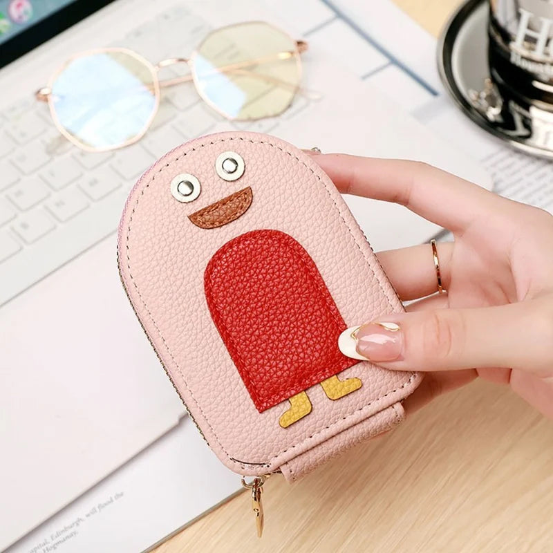 "Söt damplånbok i PU, pingvinmotiv, för kort/mynt. Ladies' accessory, kompakt och stilsäker med dragkedja."