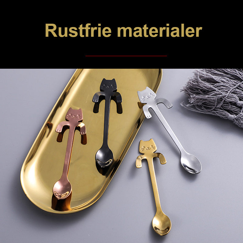 "Söt katt design dessertsked i rostfritt stål, perfekt för hushåll, med flerfärgad, lekfull tecknad kattdesign."