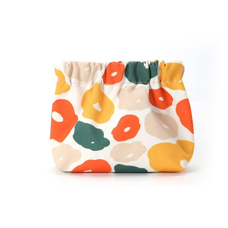 "Söt mini portabel myntväska i canvas med charmiga mönster och färger, perfekt accessoar för kvinnor, 12x5x13 cm."
