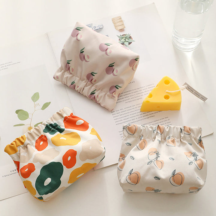 "Söt mini portabel myntväska i canvas med charmiga mönster och färger, perfekt accessoar för kvinnor, 12x5x13 cm."