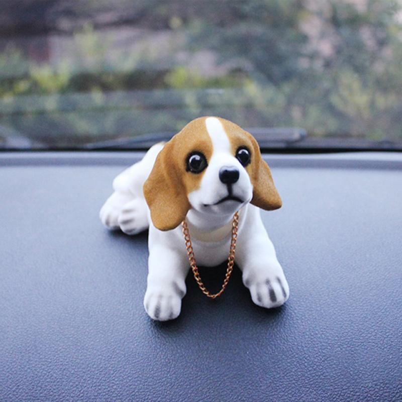 "Söt nickande Noddlehund bildekoration i miljövänligt harts, olika stilar inklusive Beagle och Husky, realistisk design."