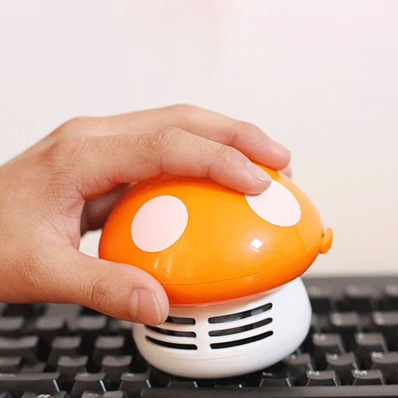 "Söt och effektiv mini dammsugare för små utrymmen, kompakt design i färgglada nyanser för smidig rengöring."