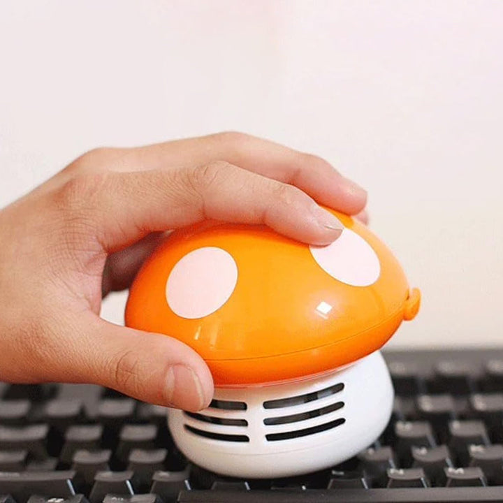 "Söt och effektiv mini dammsugare för små utrymmen, kompakt design i färgglada nyanser för smidig rengöring."