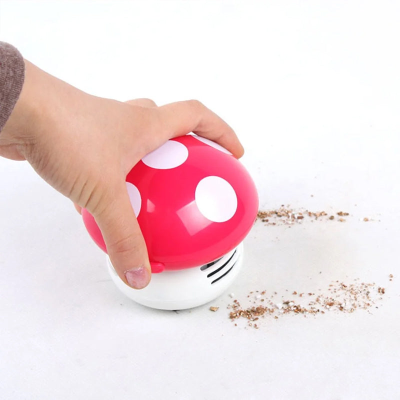 "Söt och effektiv mini dammsugare för små utrymmen, kompakt design i färgglada nyanser för smidig rengöring."