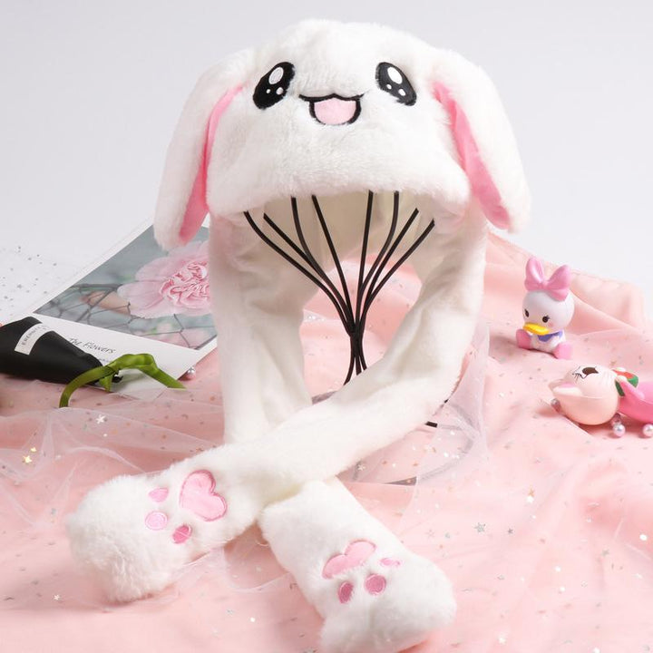 "Söt unisex plysch kaninhatt med hoppande öron, mjuk och inbjudande i olika färger för barn och vuxna."