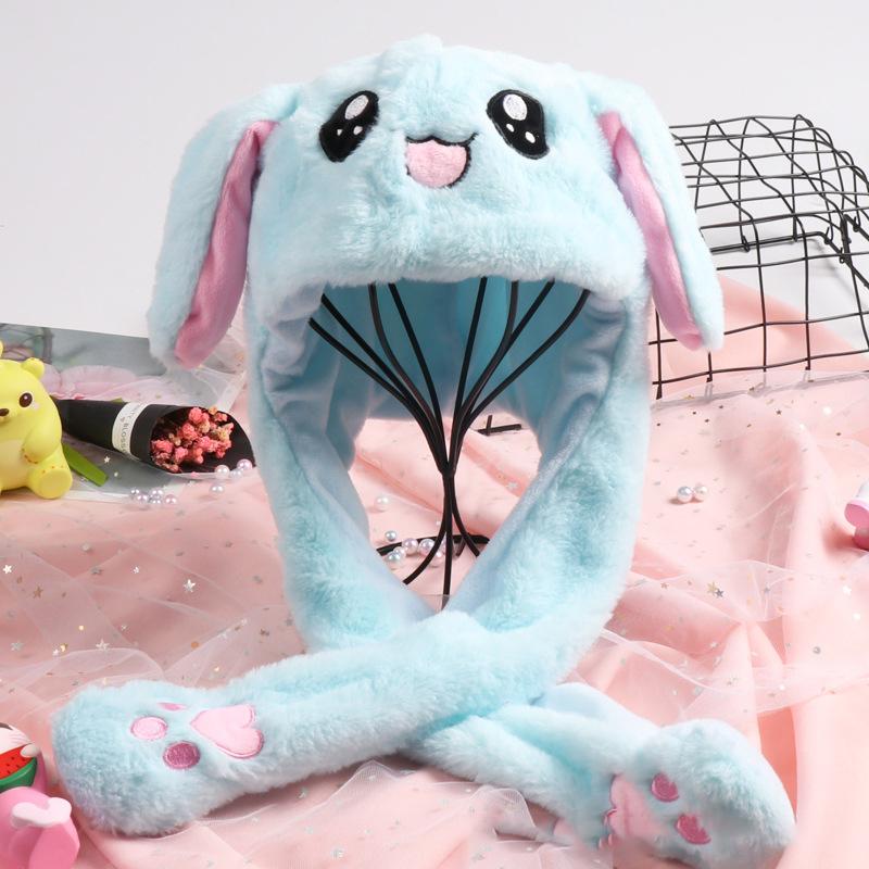 "Söt unisex plysch kaninhatt med hoppande öron, mjuk och inbjudande i olika färger för barn och vuxna."