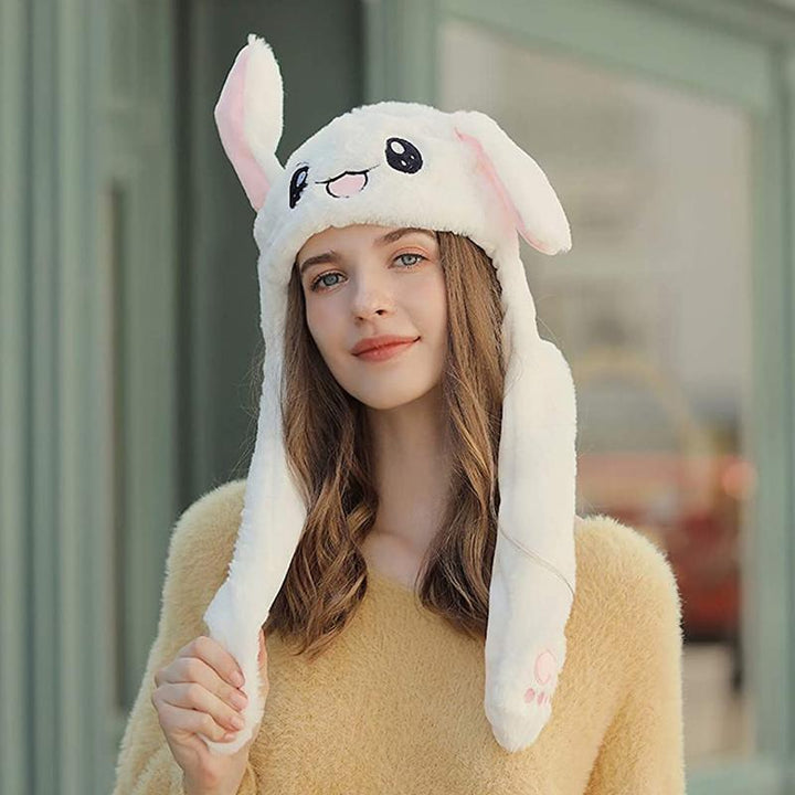 "Söt unisex plysch kaninhatt med hoppande öron, mjuk och inbjudande i olika färger för barn och vuxna."