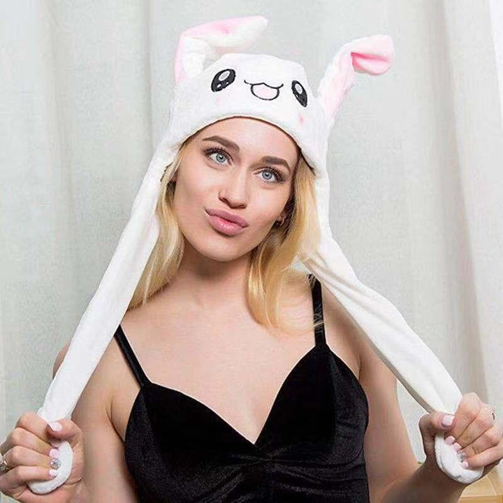 "Söt unisex plysch kaninhatt med hoppande öron, mjuk och inbjudande i olika färger för barn och vuxna."