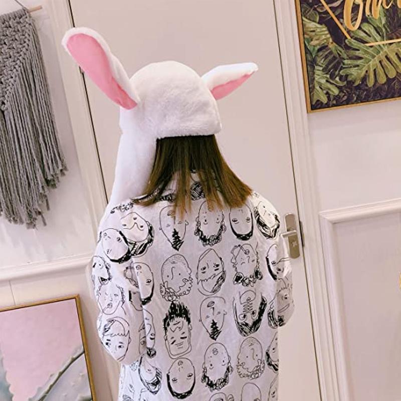 "Söt unisex plysch kaninhatt med hoppande öron, mjuk och inbjudande i olika färger för barn och vuxna."