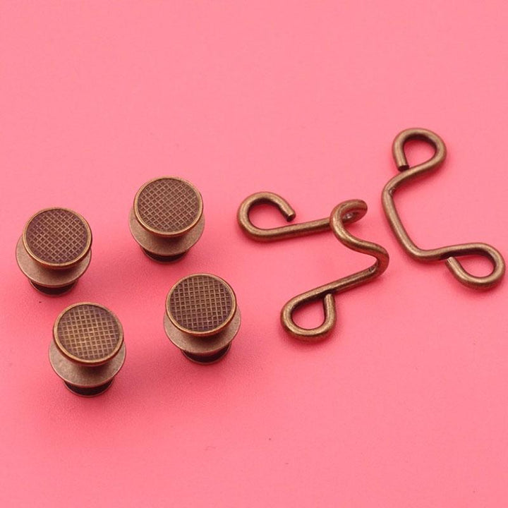 "Spikfri midjespänne för byxor i metall, blomma/silver/brons, justerbart och elegant design, passar jeans och kjolar."