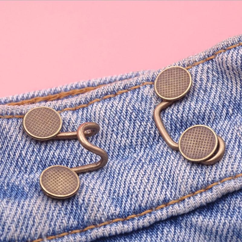 "Spikfri midjespänne för byxor i metall, blomma/silver/brons, justerbart och elegant design, passar jeans och kjolar."