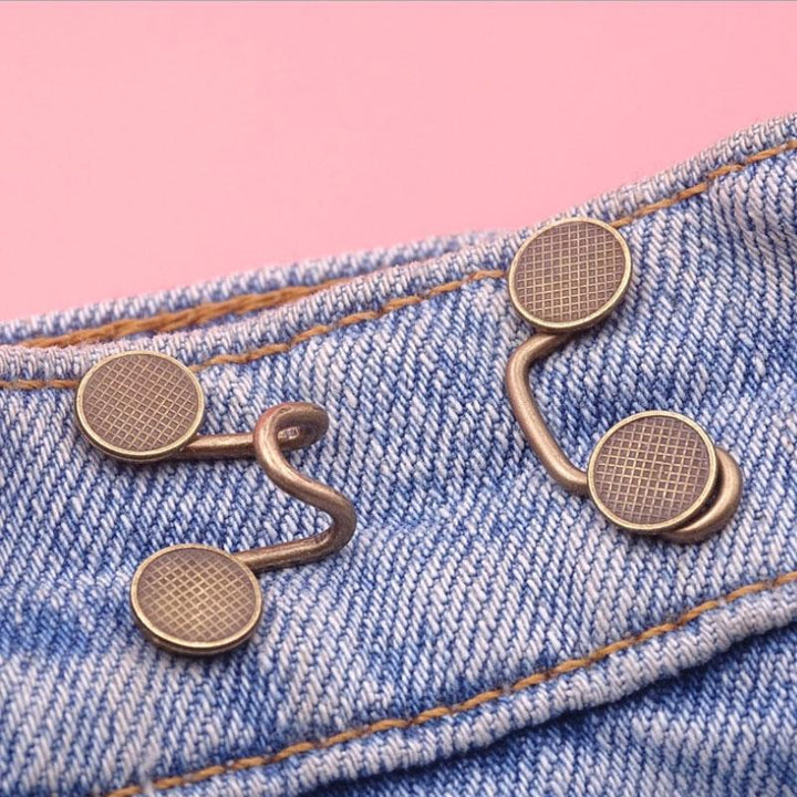 "Spikfri midjespänne för byxor i metall, blomma/silver/brons, justerbart och elegant design, passar jeans och kjolar."