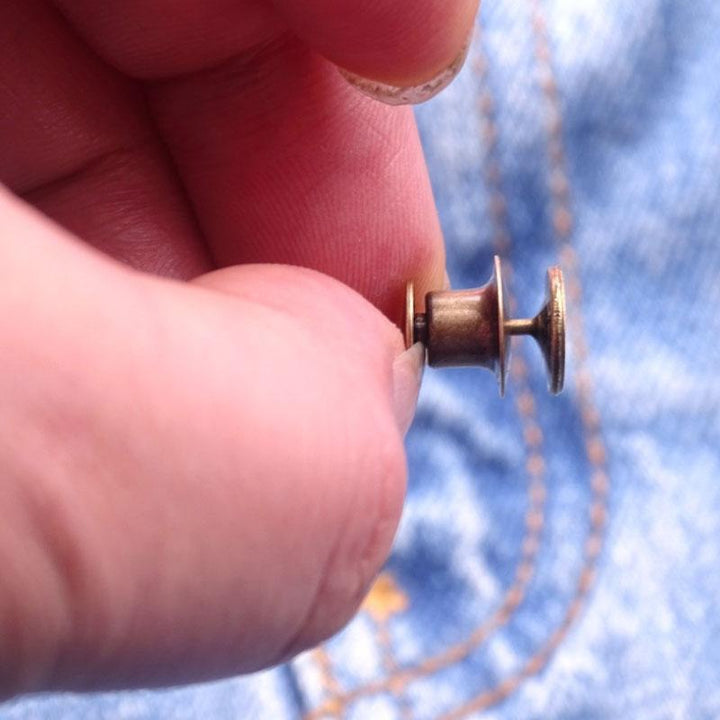 "Spikfri midjespänne för byxor i metall, blomma/silver/brons, justerbart och elegant design, passar jeans och kjolar."