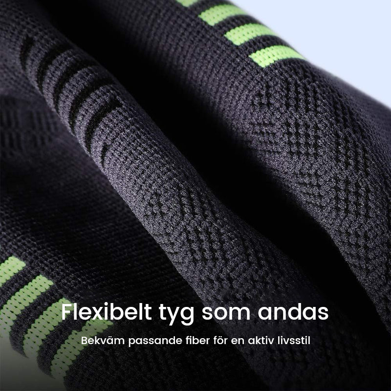 "Sportigt svart-grönt herrknäskydd med total kompression, idealiskt för stöd och smärtlindring under träning och aktivitet."