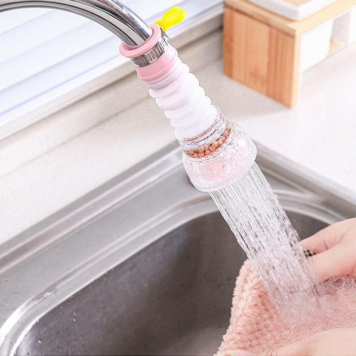 "Stänksäkert kranfilter i rosa, blå och grön med elegant design för kök och badrum, effektiv filtrering och 360° vridbarhet."
