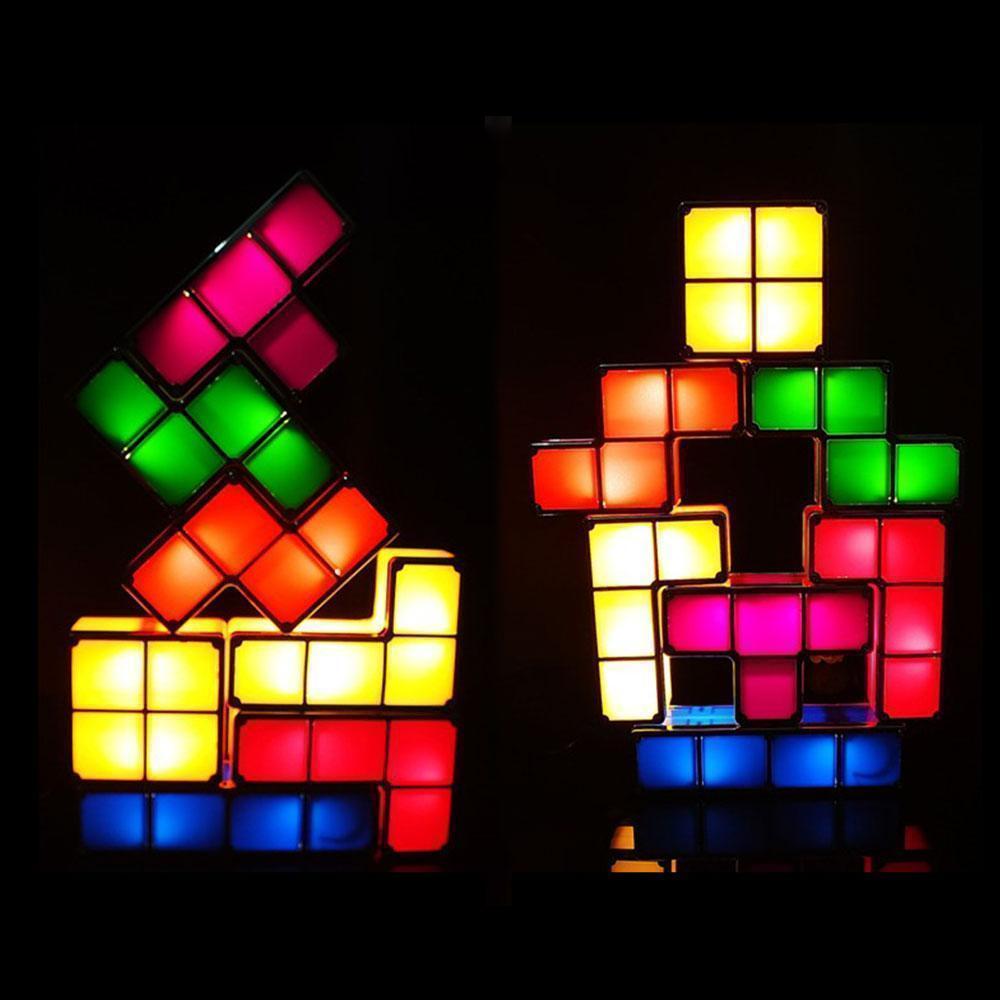"Stapelbar LED nattlampa i 7 färger, Tetris-liknande design. Färgglada block för lekfull inredning på bord och hylla."