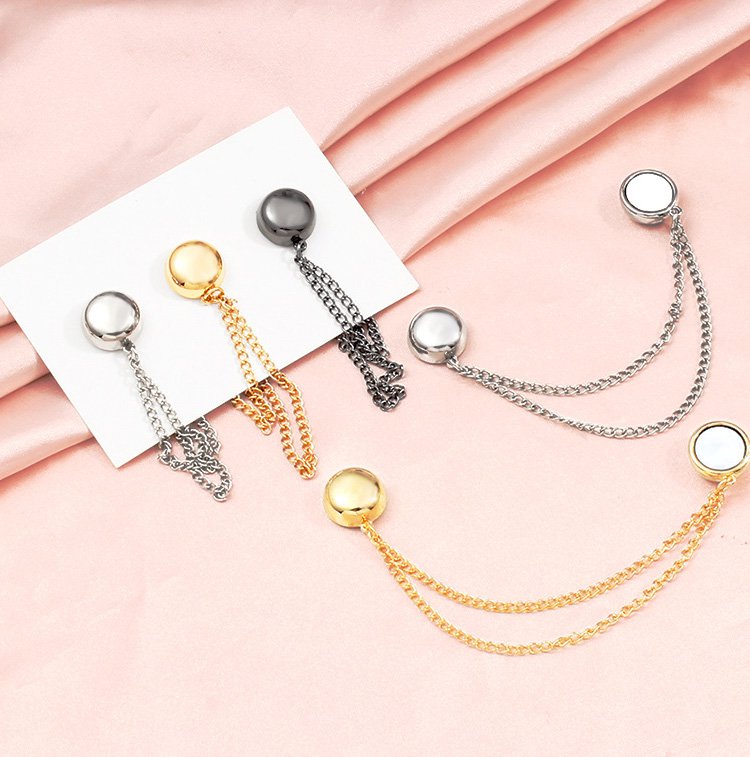 "Stark magnetisk knapp i metall för klädjustering, rund design med silverfärg, kompakt och elegant för enkel användning."