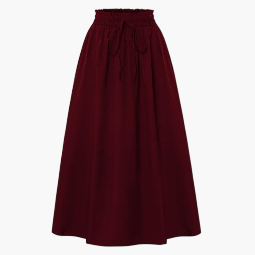 Elegant A-linje midi kjol för kvinnor med tryckt mönster och elastisk midja, perfekt för både vardag & fest.