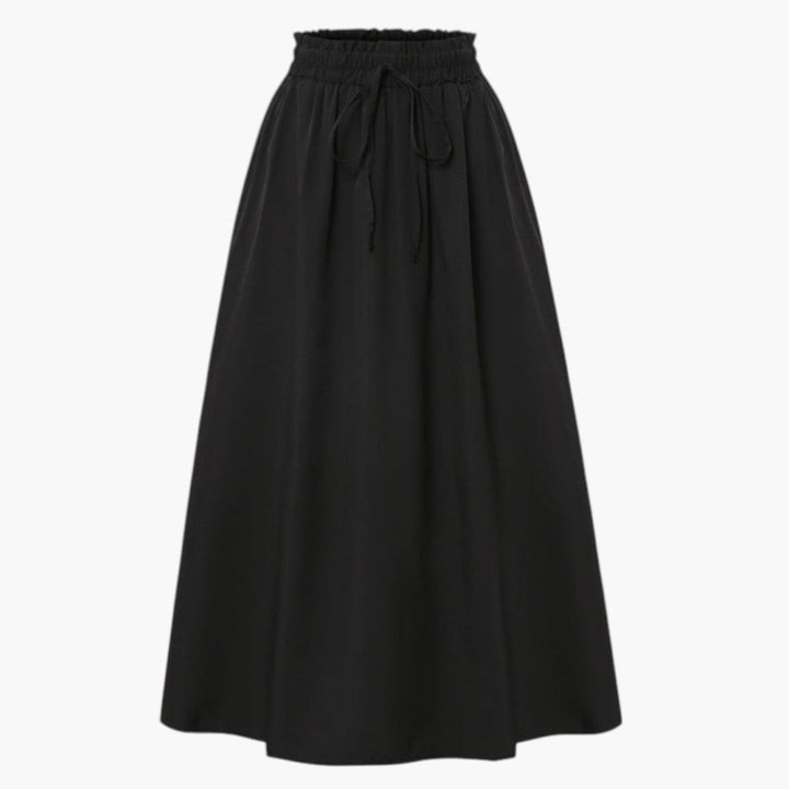 Modern midi kjol för kvinnor med unikt tryckt mönster, A-linjesilhuett och bekväm elastisk midja.