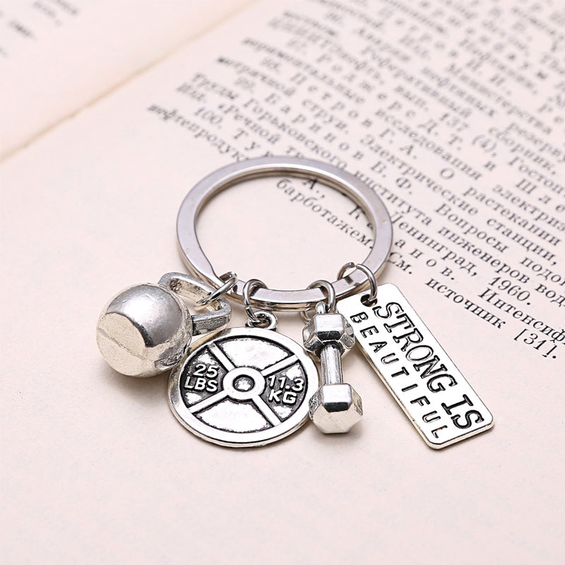 "Stilfullt oändlighetshänge i zinklegering, symboliserar personlig utveckling och motivation, elegant och minimalistisk desig