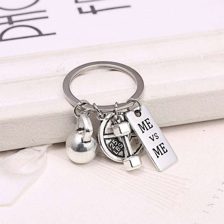 "Stilfullt oändlighetshänge i zinklegering, symboliserar personlig utveckling och motivation, elegant och minimalistisk desig