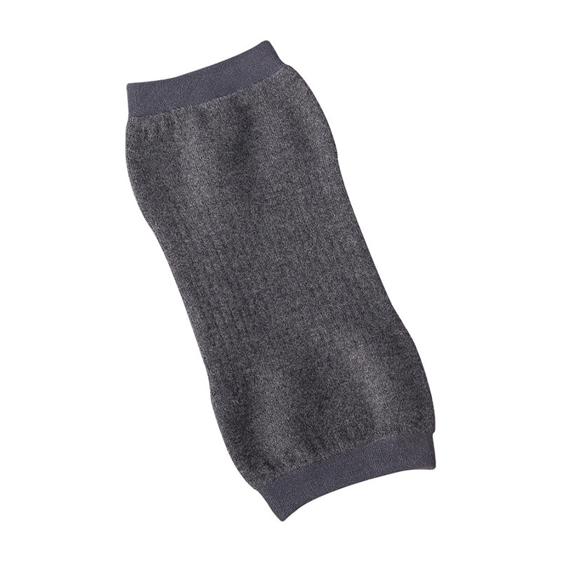 "Stiliga unisex knäskydd i svart kashmir och polyester, idealiska för sport och kyla, erbjuder komfort och värme."