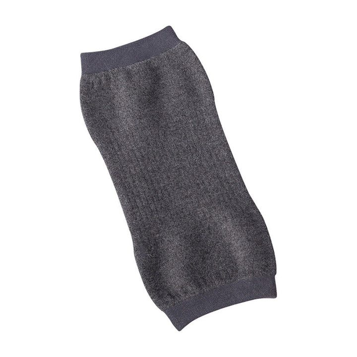 "Stiliga unisex knäskydd i svart kashmir och polyester, idealiska för sport och kyla, erbjuder komfort och värme."