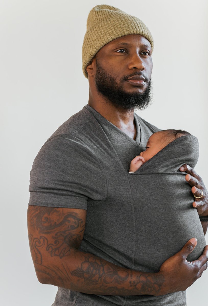 Närbild av CarrySeed Tee bärsele visar mjukt, andningsbart tyg för ultimat komfort för baby och förälder.