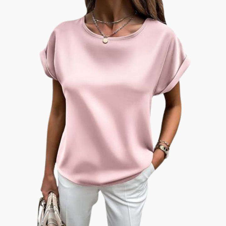 Bekväm casual damtopp i T-shirtmodell med kortärm och rundhals. Idealisk för sommar och avslappnade outfits.